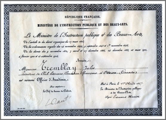 Colour photograph of a French document, produced in calligraphy. The document bears the signatures of France’s Chef du bureau du Cabinet and Édouard Herriot, Minister of Public Instruction and Fine Arts. It also bears the seal of the Department.