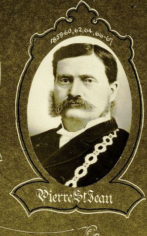 Black and white studio photograph of a man with a mustache, wearing the Mayor’s chain of office. The photograph, oval in shape, is surrounded by a decorative frame. Name and dates are indicated.